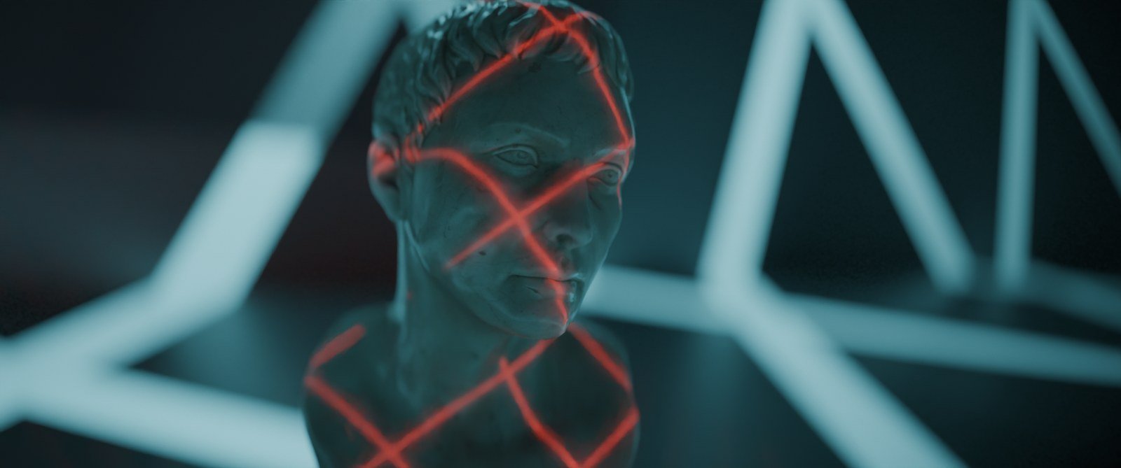 A red laser grid projected across a classical marble bust, neon tubes out of focus behind it