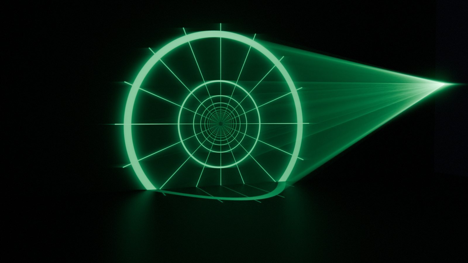 A green radial pattern of hairline rings and spokes thrown from a visible beam cone onto a dark floor